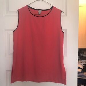 Pink sleeveless top with black contrasting edging, size M